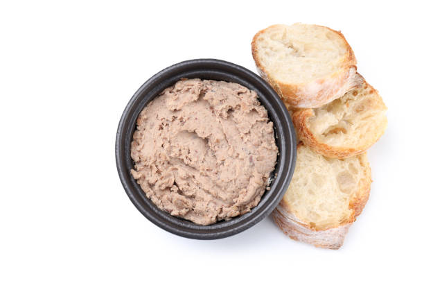 istock Bowl of pate and bread isolated on white background 2129942595