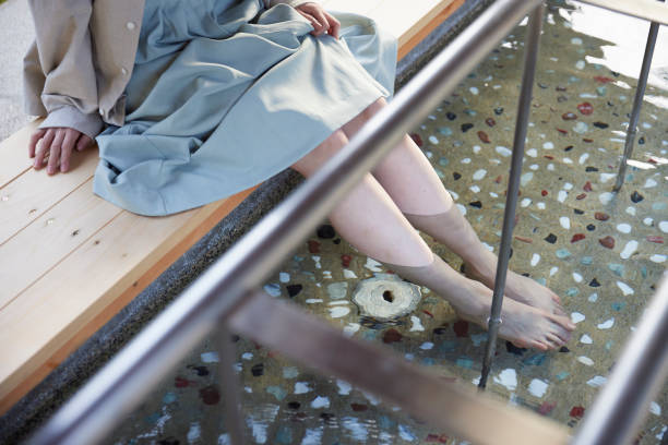 Japanese woman soaking in a footbath