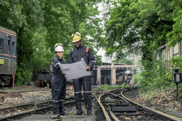 istock Engineers use blueprints for rail maintenance and troubleshooting to ensure safe train operations. 2130149878
