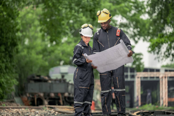 istock Engineers use blueprints for rail maintenance and troubleshooting to ensure safe train operations. 2130152610
