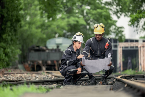 istock Engineers use blueprints for rail maintenance and troubleshooting to ensure safe train operations. 2130155741