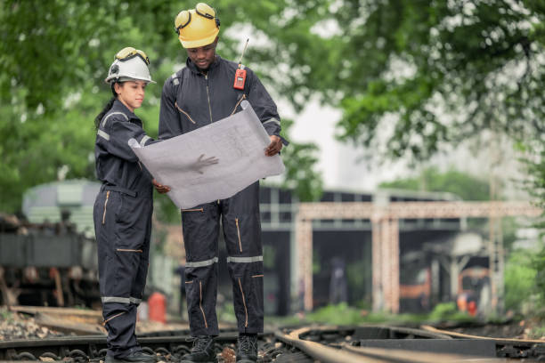 istock Engineers use blueprints for rail maintenance and troubleshooting to ensure safe train operations. 2130155744