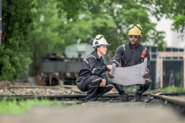 istock Engineers use blueprints for rail maintenance and troubleshooting to ensure safe train operations. 2130155746