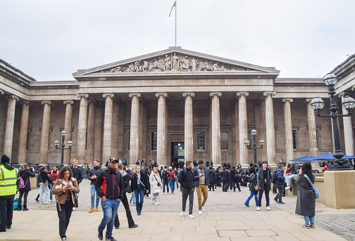 London, UK - March 31 2024: Crowds of visitors outside the British Museum on a busy day.