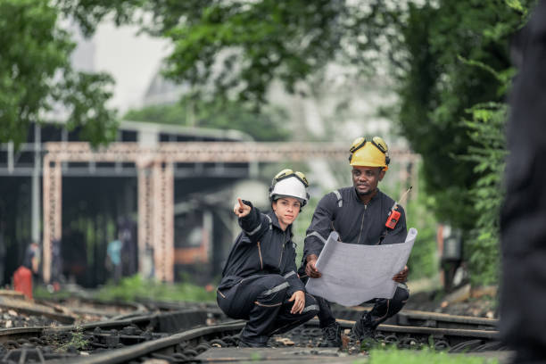 istock Engineers use blueprints for rail maintenance and troubleshooting to ensure safe train operations. 2130157821