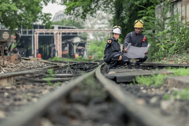 istock Engineers use blueprints for rail maintenance and troubleshooting to ensure safe train operations. 2130161485