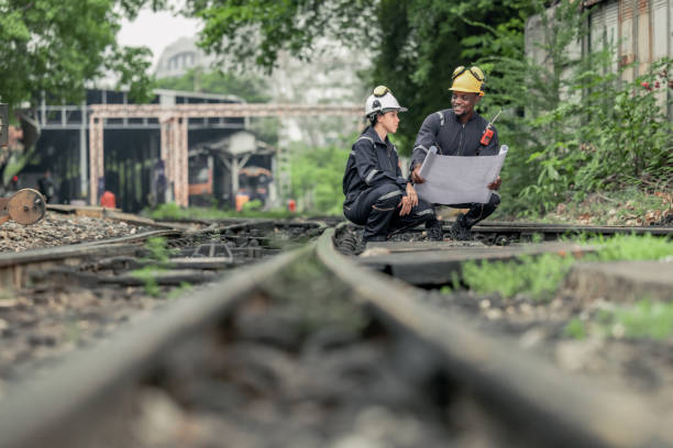 istock Engineers use blueprints for rail maintenance and troubleshooting to ensure safe train operations. 2130162041