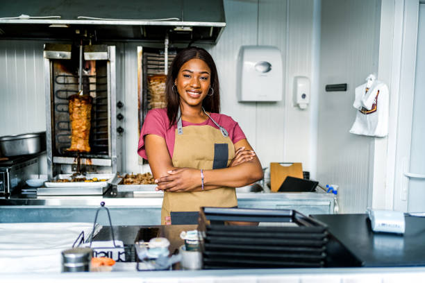 istock Woman working at a fast food restaurant 2130164888