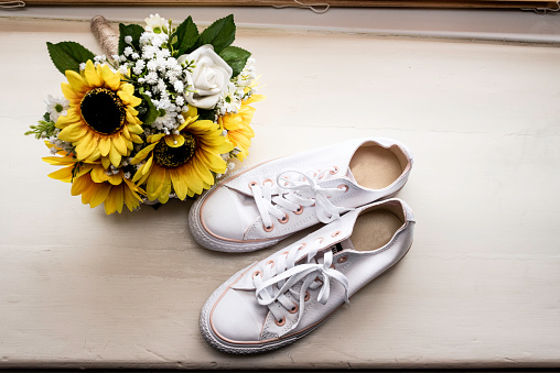 Bride's Wedding Shoes with Sunflower Bouquet