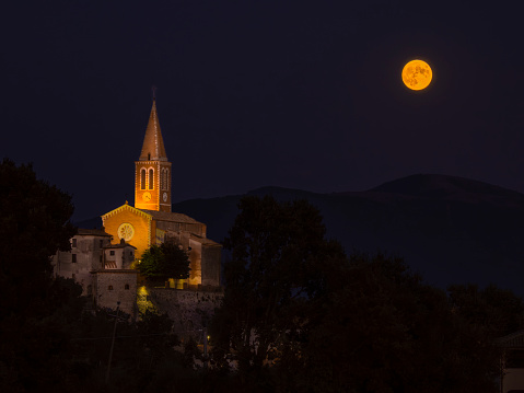 Montecastrilli, Terni, Umbria, Italy: Full moon at the Church of San Nicolò di Montecastrilli