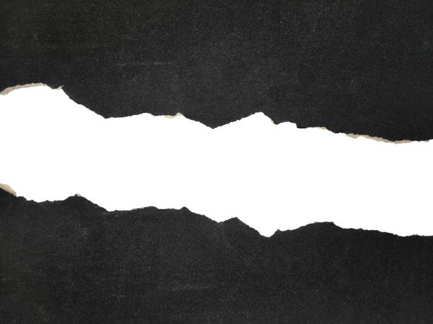 istock ripped black paper isolated, copy space. torn sandpaper texture overlay 2130329271