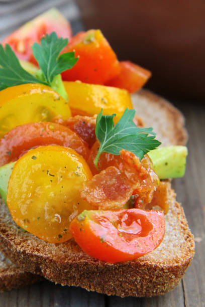 bruschetta with tomatoes and avocado on rye bread