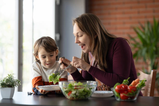 istock Mother and son having a healthy lunch together 2130414033