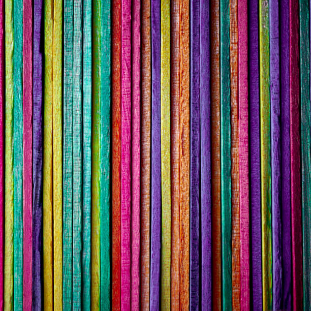 multi colored wooden craft sticks, colorful background