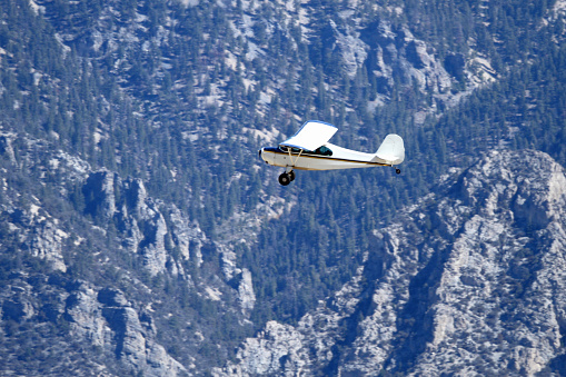 Aronca 7AC flying through the Lost River Mountains of Idaho.