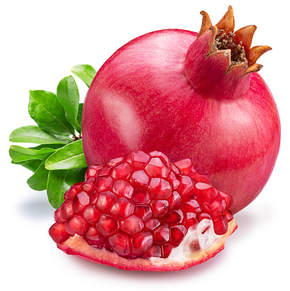 Pomegranate fruit, leaves and piece pomegranate isolated on white background.