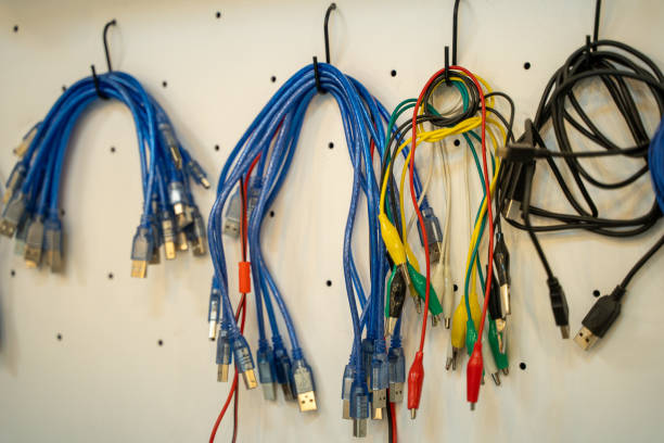 istock Lots of cables in the computer lab. 2130532975