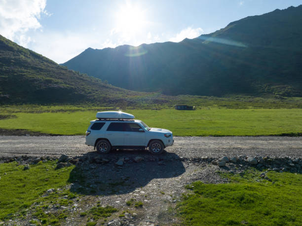 istock Car road trip on the high altitude mountain trail, China 2130562820