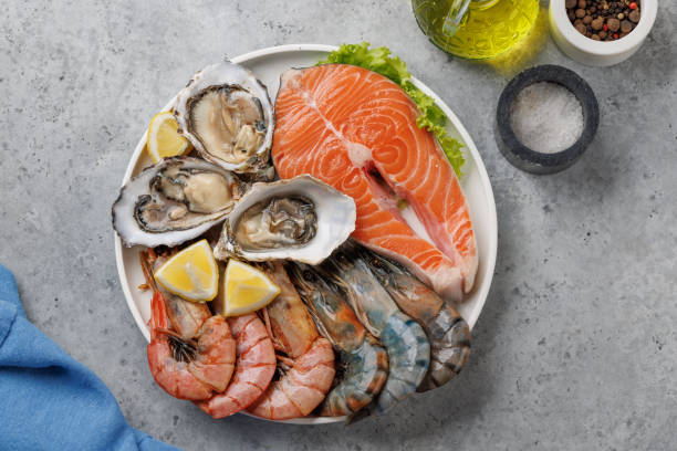 istock Seafood Platter Delight: Shrimps, Salmon, Oysters Galore 2130564772