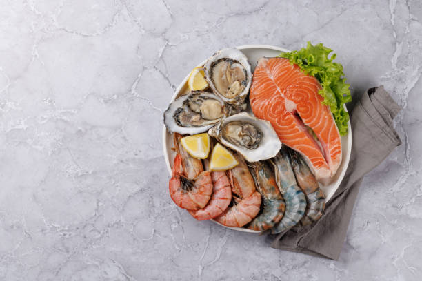 istock Seafood Platter Delight: Shrimps, Salmon, Oysters Galore 2130567399