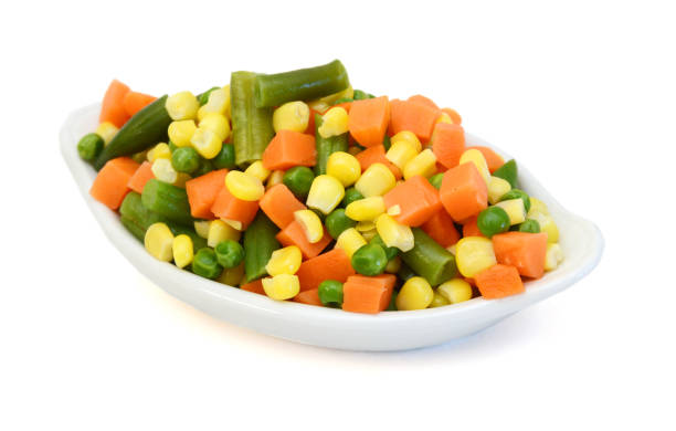 istock Fresh mixed vegetables on white. Golden mix. 2130629264