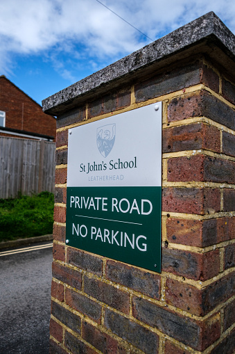 Leatherhead Surrey, UK, April 01 2024, St Johns School Private Road No Parking Sign With Nobody