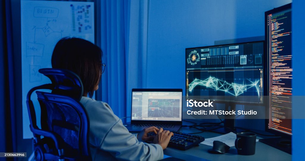 Young Asian Woman Software Developers Using Computer To Write Code ...