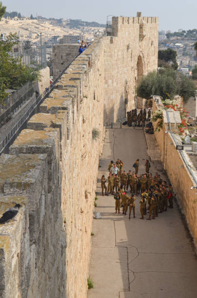 Jerusalem, Israel - December 19, 2019: Military school students practicing within the Old Town city walls, blending discipline with history in the heart of Jerusalem.
