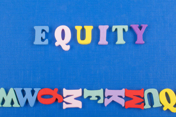 istock EQUITY word on blue background composed from colorful abc alphabet block wooden letters, copy space for ad text. Learning english concept. 2130691421