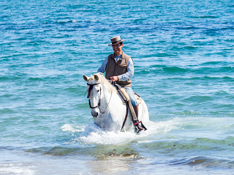 Mijas, Malaga, Spain. 03/15/2024. Traditional concentration of horse riders on the beach of La Cala, Mijas, Spain.