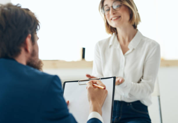 istock man and woman communication psychology assistant problems consultation 2130794354