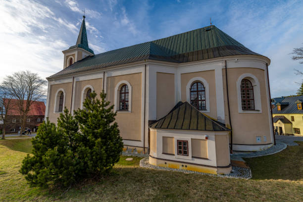 church in spring blue sky evening in bozi dar cz 03 29 2024 - cz zdjęcia i obrazy z banku zdjęć