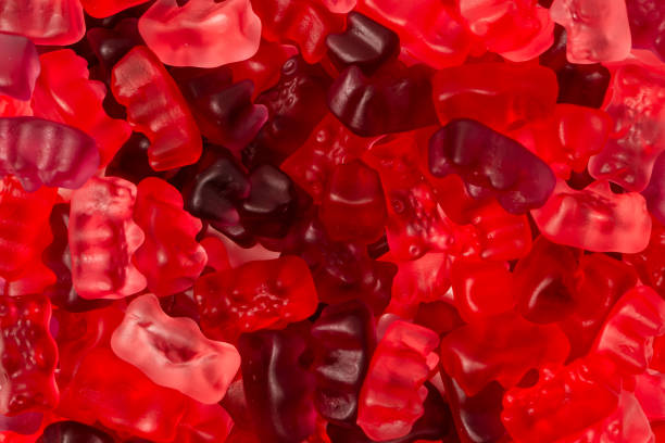 istock Assorted red gummy candies. Jelly bears. 2130863614