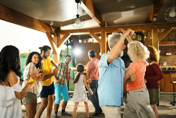 istock Friends dancing at a party. 2130864763