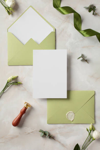 istock Wedding invitation card template with olive envelopes top view. 2130887838
