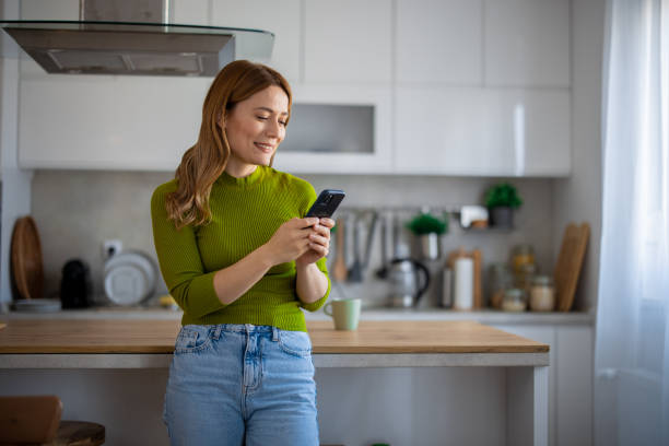 istock Young woman using the mobile phone 2130893752