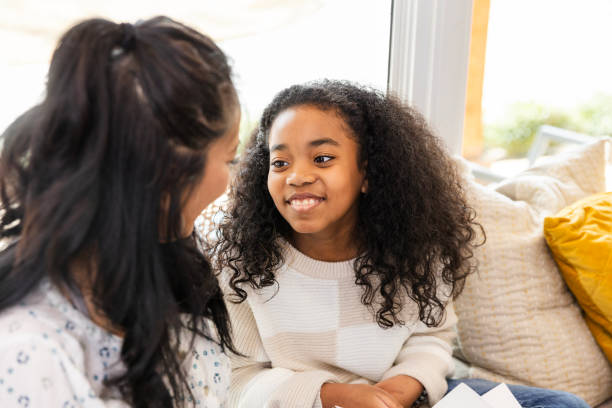 istock Young girl soaks up unrecognizable mother's praise 2130898508