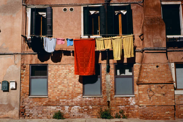 Colorful towels hanging on a clothesline in Venice, Italy in April.