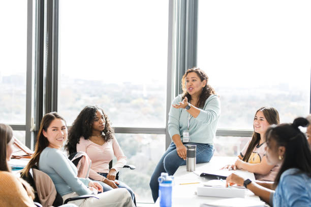 istock Female teacher engages diverse students 2130928463