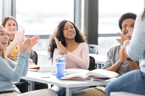 istock Diverse high schoolers applaud good news 2130928491