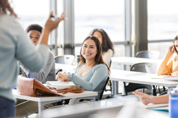 istock Unrecognizable female professor gestures while talking to the high school students 2130932123