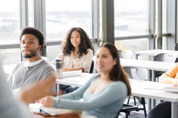 istock Multiracial group of students listen to their professor 2130932490