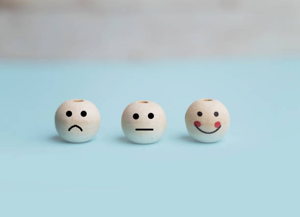 istock Wooden cubes with different emotions . Empathy concept 2130941489