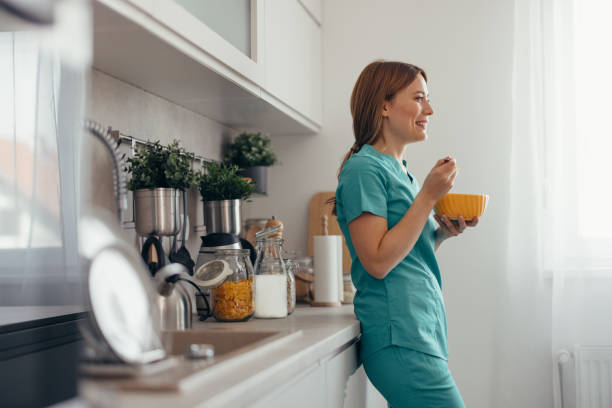istock Nurse getting ready for her job in the morning. 2130957636
