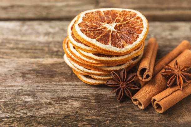 istock Cinnamon sticks and anise on a textured background. Cinnamon roll and star anise. Spicy spice for baking, desserts and drinks. Fragrant ground cinnamon.Place for text. copy space. 2130962838