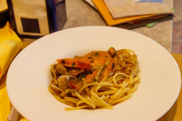 istock Pasta spaghetti with seafood and sauce on a table 2130975042