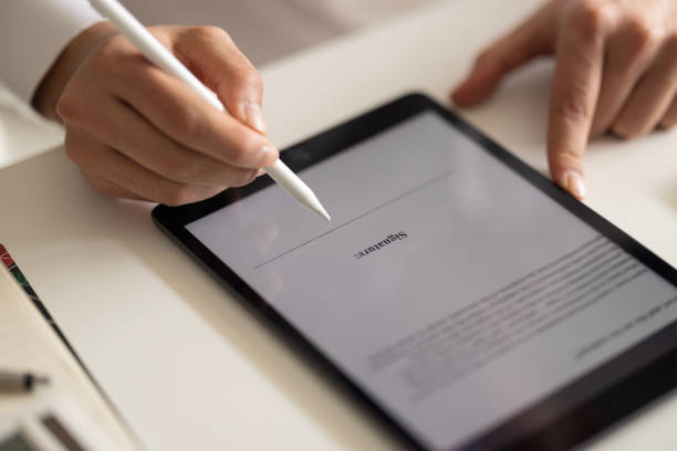 istock Businessman Signing Electronic Contract On Digital Tablet 2130993555