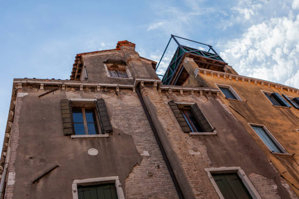 View to typical house in Venice with windows with shutters
