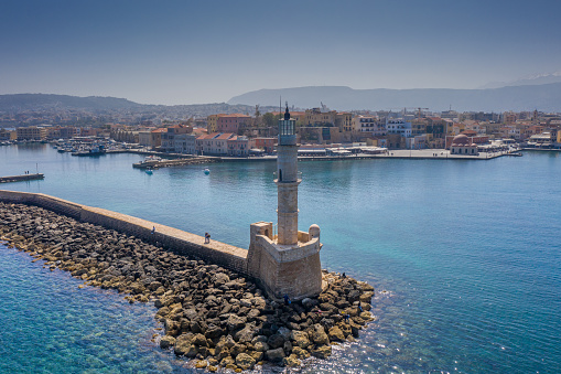 The old Venetian port in Chania with the Characteristic lighthouse and mosque