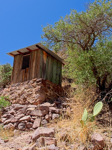 Old outhouse in Organ mountains abandoned settlement.